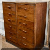F52. 12-Drawer oak cabinet. 